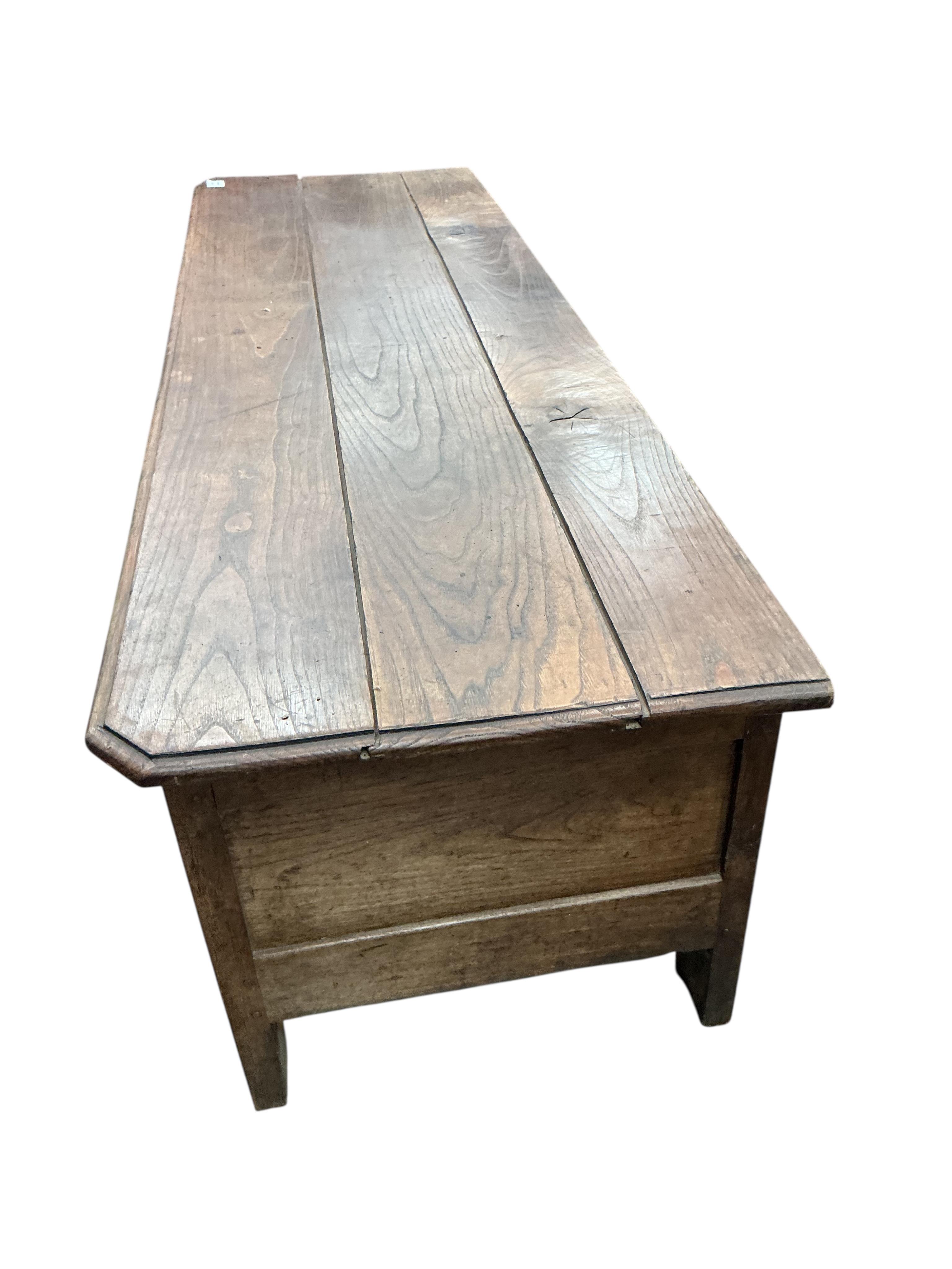 An 18th century Continental oak coffer, width 172cm, depth 53cm, height 53cm